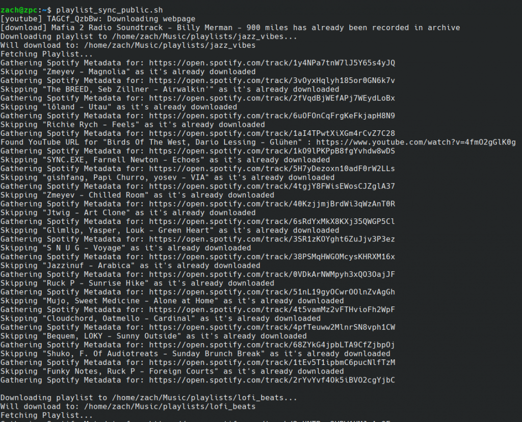A screenshot of the script running. The script first downloads the YouTube songs you specify, then the Spotify playlists you specify. If a song already has been downloaded, the script will not attempt to download it again.